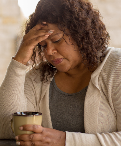 A woman practicing self-care and healthy living during menopause through diet and exercise.